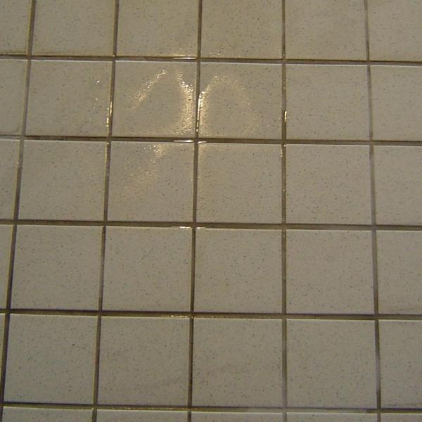 How to clean grout between tiles